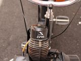 a close up view of a motorcycle with a mirror on it