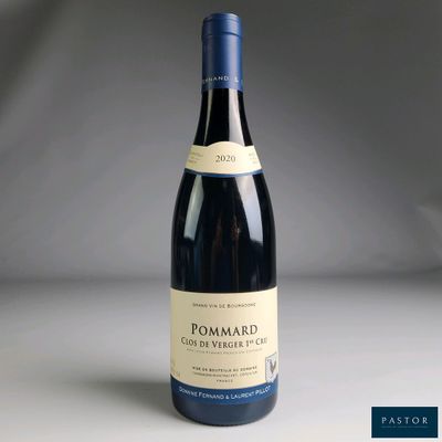 a bottle of wine that is sitting on a table