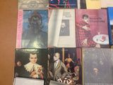 a lot of books that are on a table