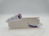 a piece of electrical wire that is connected to a power strip