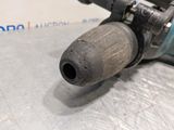 a drill that is sitting on a table