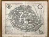 an old map of the city of paris in a wooden frame