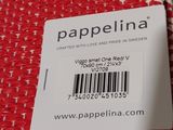 red and white woven fabric with a barcode label on it