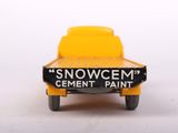 a yellow toy truck with a sign on the back of it