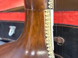 a large wooden instrument that is sitting on a table