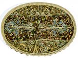 une photo d'un moule à tarte orné d'un motif décoratif