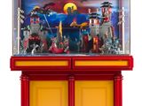 une vitrine rouge et jaune contenant un château