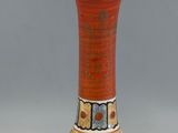 a vase that is sitting on a table