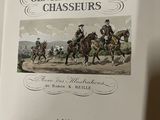 un livre sur lequel figure la photo d'un groupe d'hommes à cheval