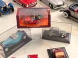 a lot of toy cars that are on a table