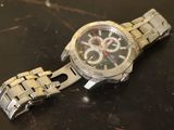 a watch that is sitting on a table