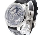 a silver watch with a black leather band on a white background