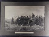 an old picture of a group of men standing next to each other in a field