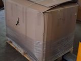 a large box sitting on a pallet in a warehouse