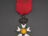 a close up of a medal with a star on it