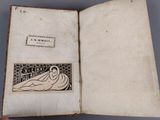 an open book with a drawing of a woman on it