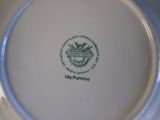a plate with a picture of a bird on it
