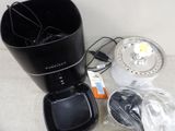 a coffee maker that is sitting on a table
