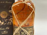 an image of a bottle of whisky next to a box of wine