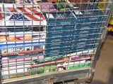 a cart full of books in a store with a flag on the back