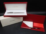 an image of a red box with a pen inside of it