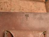 a close up of a piece of luggage on a shelf