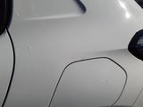 a close up of a car ' s door handle and door handle
