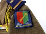 a badge on the back of a man ' s uniform