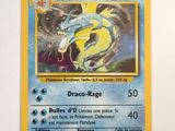 a pokemon card with a picture of a dragon on it