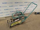 a small machine that is sitting on the ground