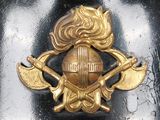 a close up of a metal object with a helmet on it