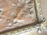 a picture of a bronze statue of a man on a horse