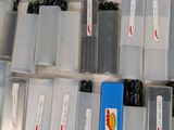 a lot of plastic boxes with different types of screws