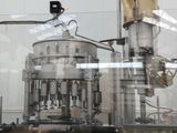 une machine qui contient beaucoup de bouteilles
