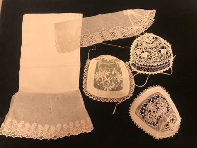 a black and white photo of a collection of doily items