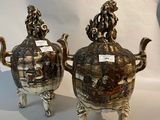 pair of antique silver plated teapots with handles and feet