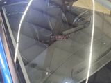a picture of a car ' s interior with the door open