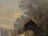 un tableau posé sur un chevalet, avec en arrière-plan le tableau représentant une maison