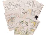 a lot of drawings on a table with a white background