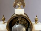 a clock that is sitting on top of a table