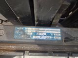 a close up of a car ' s engine with a sticker on it