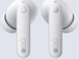 an image of two white earphones with a button on each side