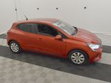 a red car parked in a garage with a checkered floor