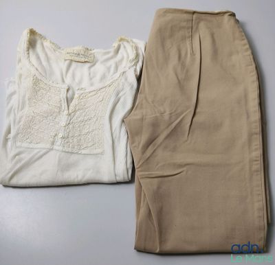 two pieces of clothing are sitting on a table next to each other