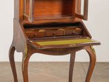 an old wooden desk with a drawer on top of it