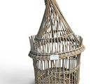 a bird cage with a bird in it on a white background