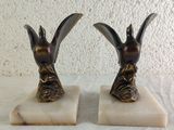 pair of antique brass rabbit bookends on marble bases