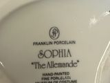 a white porcelain vase with a black and white label on it
