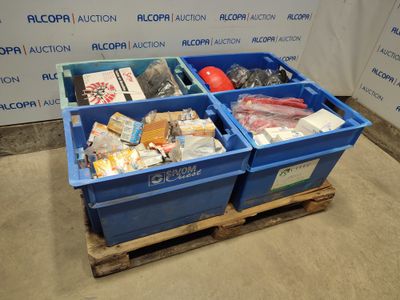 two blue bins that are sitting on a pallet