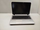a laptop that is sitting on a white table